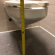 Measurement of the toilet height in the 28th floor “accessible” stall.